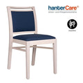 Chaise empilable pour seniors CRISTIANA EE EMP en bois de hêtre avec rembourrage facile à entretenir pour établissements de soins et hôtels