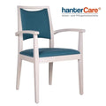Fauteuil à accoudoirs pour seniors DENISE 01 CB en bois de hêtre avec un rembourrage facile à entretenir pour les établissements de soins et les hôtels