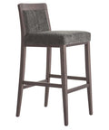 Tabouret DUBAI BAR - Série de chaises best-seller DUBAI, élégamment fabriqué en bois de hêtre massif et personnalisable.